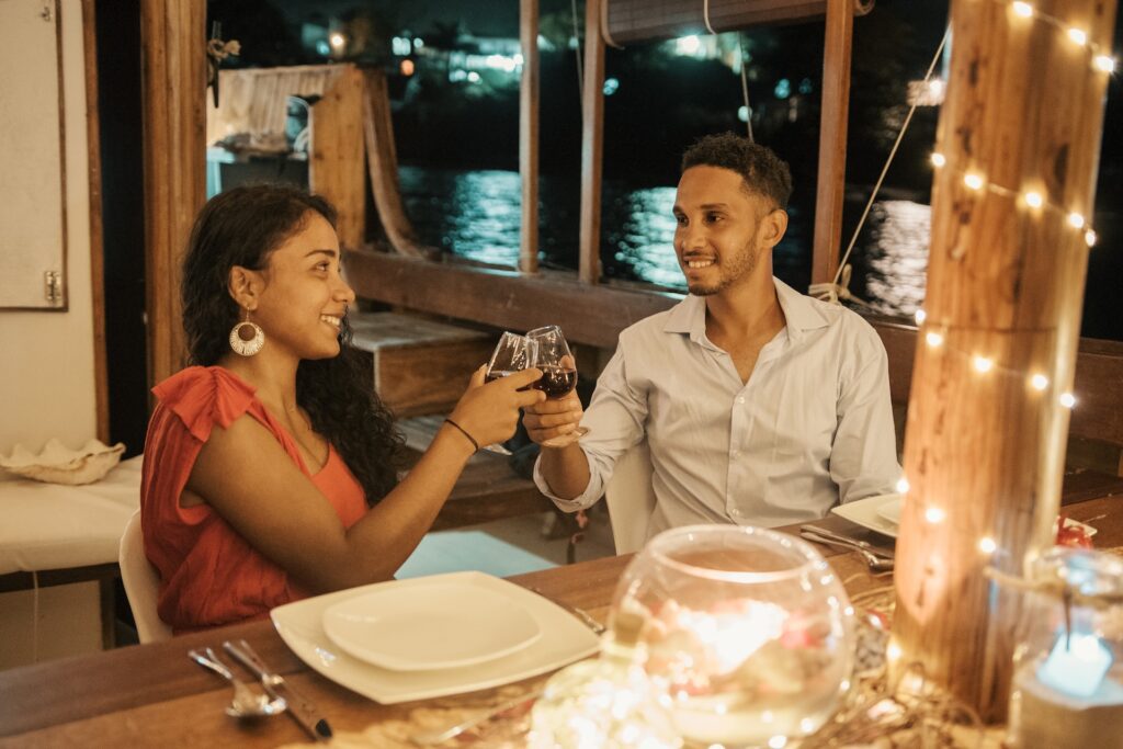 Dinner table set on board at dusk